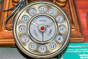 Detail of old wood and copper telephone