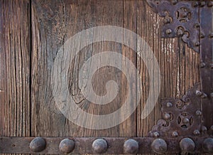 Detail of old wood plank and decorative metal