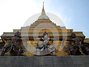 The giants monkey statue under golden stupa in Bangkok