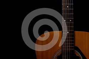 Detail of orange acoustic guitar