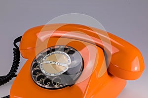 Detail orange vintage dial telephone