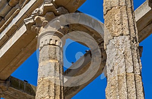Detail of the ornate moldings on the Corinthian order columns and capitals of the well-preserved Roman Temple of Diana under a