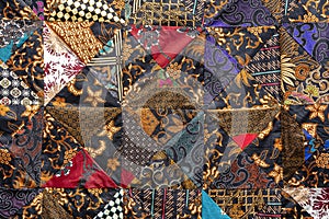 Detail patchwork quilt in market. Bali island, Ubud, Indonesia. Closeup patchwork blanket texture