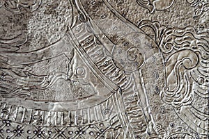 Detail of a patterned silver metal plate