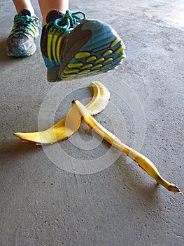 Detail of Person Stepping on Banana Peel and Slipping