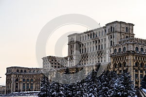 Detail photo of the famous Palace of the Parliament Palatul Parlamentului in Bucharest during winter season photo