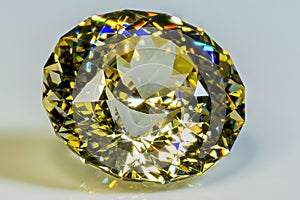 Detail photo focus stacking of a self-cut Cubic Zirconia with Lemon color and Round Brilliant Portuguese cut, placed on a white