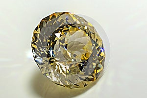 Detail photo focus stacking of a self-cut Cubic Zirconia with Lemon color and Round Brilliant Portuguese cut, placed on white ac