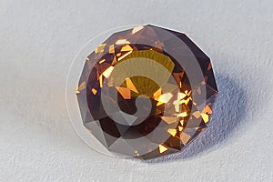 Detail photo focus stacking of a self-cut Synthetic Corundum with Padparadscha nr55sp color and Round Brilliant Spinner cut, pla photo