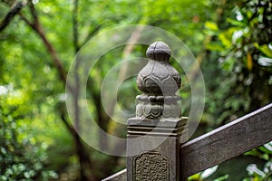 Detail of a pillar sculpture on a stone bridge in a park in Wenzhou in China - 1