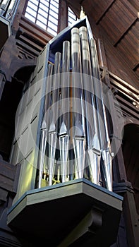 Detail of a pipe organ of a church in a small town