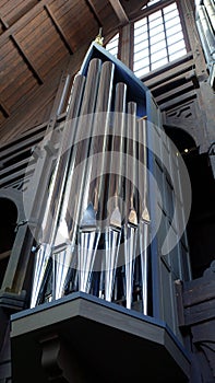 Detail of a pipe organ of a church in a small town