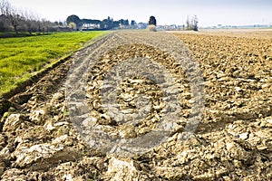 Detail of a plowed field in Tuscany countryside Italy- space for text insertion