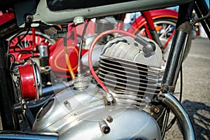 The detail of the polished old motorbike