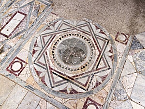Detail of the polychrome opus sectile of the room with the three-light window in the Domus of Nymphaeum in Ostia Antica, Rome photo
