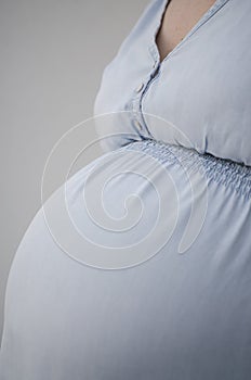 Detail of pregnant woman