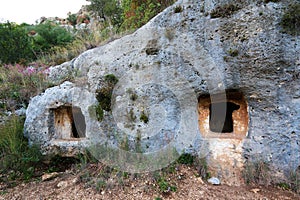 Detail of prehistoric tombs in the necropolis of Pantalica photo