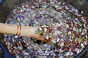 Detail of the preparation of mucilage by soaking raw seeds photo