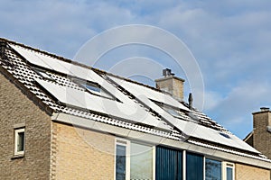 Detail of Private solar panels with snow