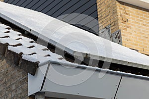 Detail of Private solar panels with snow