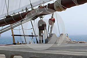 Detail of pulleys and hoists of a schooner