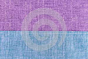 Detail of a purple and blue fabric texture background.