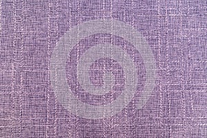 Detail of a purple fabric texture background.