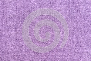 Detail of a purple fabric texture background.