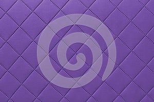 Detail of purple sewn leather, purple leather upholstery background pattern