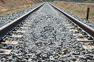 Detail of a railway track from a level crossing