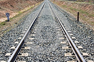 Detail of a railway track from a level crossing