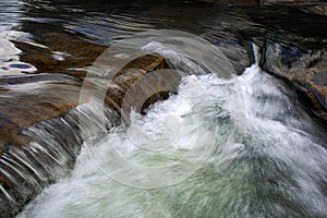 detail of the rapids on the autumn river