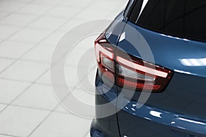 Detail on the rear light of a car. Car detail. Developed Car`s rear brake light
