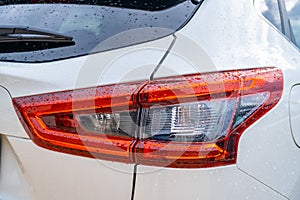 Detail of rear light on a modern white car