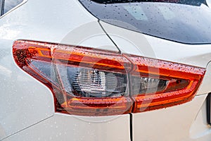 Detail of rear light on a modern white car