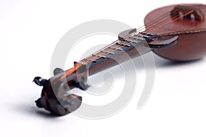 Detail of rebab, arabic musical instrument, isolated on white background photo