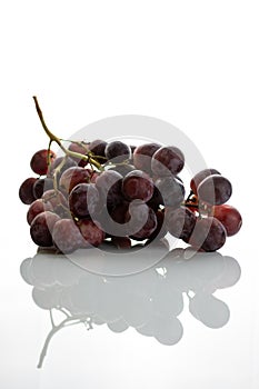 Red grape cluster isolated on white background