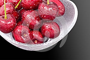 Detail of red sweet cherries in a bowl. Prunus avium