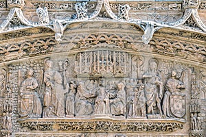 Detail religious sculpture and coronation on the facade of the conventual church of San Pablo