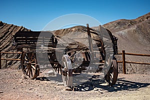 Detail of the remains of an old wooden cart in a town in the far west. Is abandoned