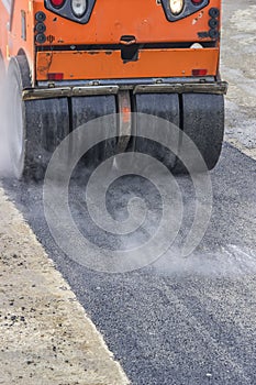 Detail of road roller during asphalt patching works 3