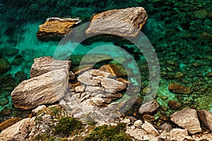 The detail of rocky beach in Corsica of France