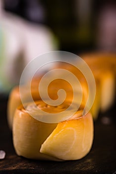 Detail of the rolled parenica cheese with others in a row