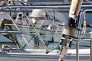 Detail of a roller-furling jib of a sailboat moored in the harbor