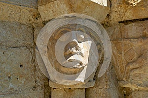 Detail of the Romanesque church of Ribera ÃÂlava. Abandoned village in the natural park of Valderejo. Sculpture photo