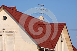 detail of roof of the house against blue sky