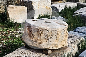 Detail of round broken section of column of Parthenon at Athens Acropolis that has been identified but not yet used in