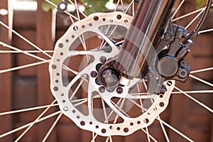 detail of rusty bicycle hydraulic disc brake