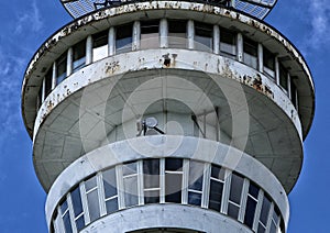 Detail of rusty metal white outlook tower cabin