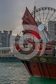 Detail of the sail of a traditional red junk boat